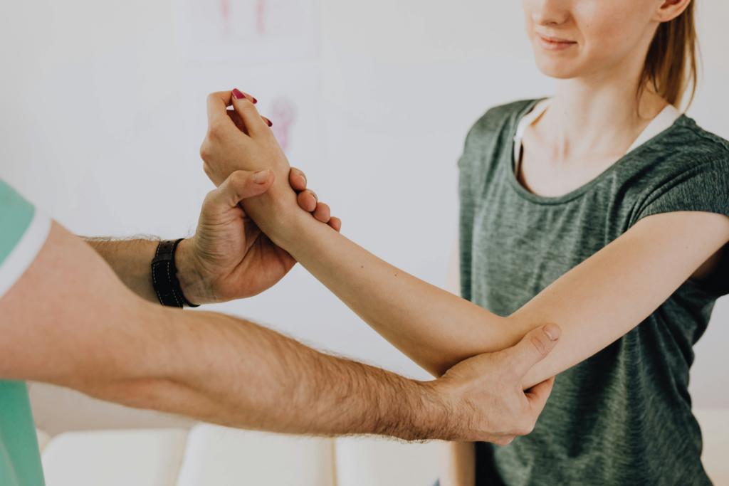 Active Release Techniques (ART) on a patient’s elbow